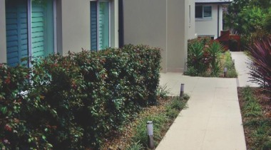 Gem ivory outdoor walkway - RAK Gem Outdoors backyard, courtyard, estate, facade, garden, grass, home, house, landscape, landscaping, plant, property, real estate, residential area, shrub, siding, walkway, wall, yard, gray, black