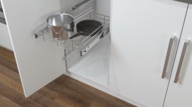 Pull out chromed wire drawers with a host countertop, drawer, floor, flooring, furniture, kitchen, product, product design, table, gray, brown