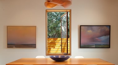 The chandelier makes for an interesting focal point. architecture, ceiling, chair, dining room, furniture, home, house, interior design, light fixture, table, brown