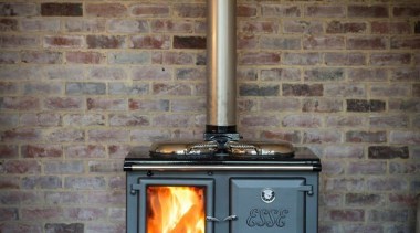 ESSE Ironheart - legs model. Cooking, hot water hearth, home appliance, major appliance, masonry oven, stove, wood burning stove, gray, black, brown