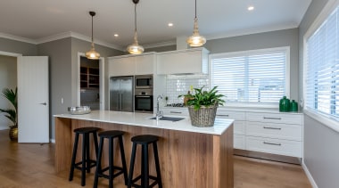 A lovely open plan kitchen with scullery features cabinetry, countertop, cuisine classique, interior design, kitchen, real estate, room, gray