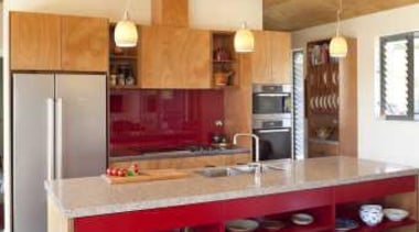 Kitchen with red accent and wooden furnitures - architecture, cabinetry, ceiling, countertop, floor, flooring, hardwood, interior design, kitchen, laminate flooring, living room, real estate, room, table, wall, wood, wood flooring, orange