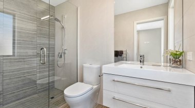 Tiled shower with frameless glass, vanity from Raymor, bathroom, floor, home, interior design, product design, property, real estate, room, gray