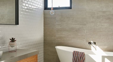 White tiles behind the vanity balance out the architecture, bathroom, floor, flooring, home, interior design, plumbing fixture, room, sink, tap, tile, wall, wood flooring, gray