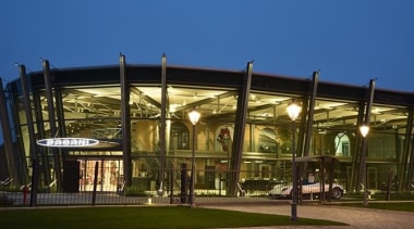 Learn more about NeriGet Neri lights architecture, building, city, corporate headquarters, evening, landmark, metropolitan area, mixed use, night, residential area, sky, structure, brown, blue