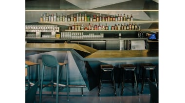 A wider view of the bar area - furniture, interior design, table, black, white