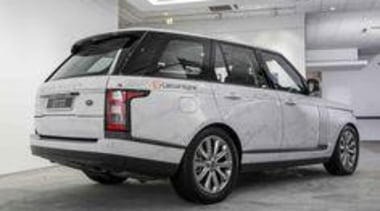 Caesarstone Calacatta Nuvo Launch Singapore Range Rover alloy wheel, automotive exterior, automotive tire, automotive wheel system, bumper, car, family car, land vehicle, mode of transport, motor vehicle, personal luxury car, range rover, rim, sport utility vehicle, tire, vehicle, vehicle registration plate, wheel, gray