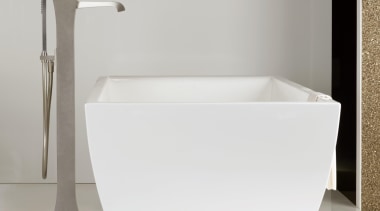 The Mimi floor-mount tub filler makes a vivid angle, bathroom, bathroom sink, bidet, ceramic, plumbing fixture, product design, sink, tap, toilet seat, white