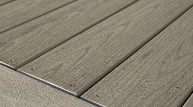 The owner of this Canterbury home chose to angle, floor, line, plank, plywood, texture, wood, wood stain, gray