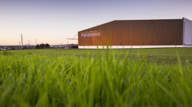 MERIT WINNERPanasonic Building (2 of 4) - Trends architecture, energy, farm, field, grass, grass family, grassland, green, house, lawn, meadow, plain, plant, prairie, rural area, sky, structure, brown