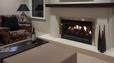 Mellons Bay 13 - fireplace | floor | fireplace, floor, flooring, hearth, interior design, living room, wood burning stove, gray, black