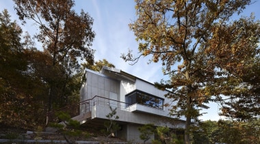 This corner window means excellent panoramic views architecture, building, cottage, home, house, plant, property, real estate, sky, tree, black