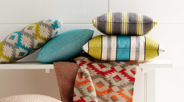 With a Mayan pattern influence, our latest collection couch, cushion, furniture, interior design, linens, pillow, product, table, textile, white