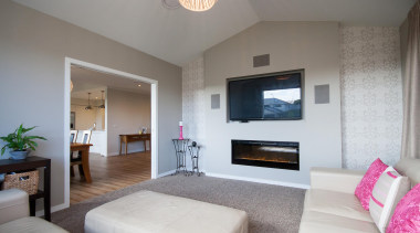 A pitched ceiling facilitated by scissor  trusses ceiling, estate, home, interior design, living room, property, real estate, room, suite, gray