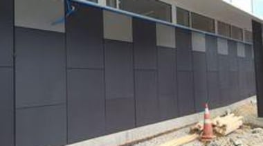 A new radiology clinic in Tauranga, New Zealand, facade, real estate, siding, wall, gray, black