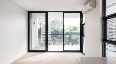 Black door frames and windows draw the eye architecture, daylighting, door, home, house, interior design, property, real estate, window, white