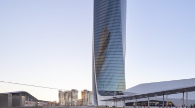 The tower is just one part of the architecture, building, commercial building, condominium, corporate headquarters, daytime, headquarters, metropolis, metropolitan area, mixed use, reflection, sky, skyscraper, tower, tower block, teal