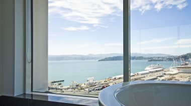 High performance windows protect the cliff top home apartment, condominium, property, real estate, sea, sky, window, white, gray