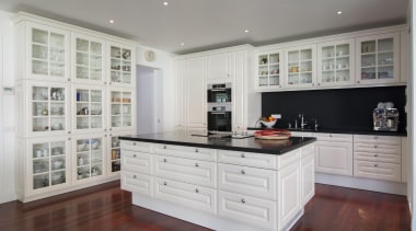 Contemporary technology is combined with timeless aesthetics and cabinetry, countertop, cuisine classique, floor, flooring, hardwood, interior design, kitchen, room, wood flooring, gray