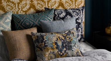 Persian influences and modern interpretations of textured weaves, bed, bed sheet, bedding, bedroom, blue, cushion, duvet cover, furniture, interior design, linens, pattern, pillow, room, textile, wall, black, gray