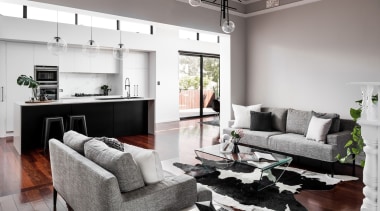 The living space is large and open, with floor, furniture, home, interior design, living room, property, real estate, room, white, gray