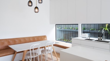 This dining area is ideal for a young floor, house, interior design, kitchen, product design, table, white, gray