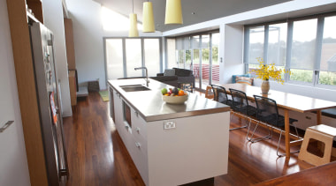 The new kitchen island bench is detailed as countertop, interior design, kitchen, real estate, white, brown, gray