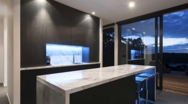 Black and white kitchen design with hidden storage architecture, countertop, glass, interior design, lighting, property, real estate, window, black, gray