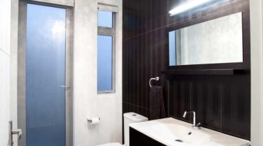 Elegant bathroom with beautiful ceiling light - Bathroom bathroom, bathroom accessory, bathroom cabinet, ceiling, floor, interior design, room, sink, white, black