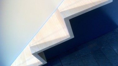 Photo by Amy Gardner - A closer view angle, architecture, daylighting, daytime, line, product design, sky, stairs, structure, triangle, white, blue