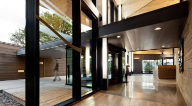 The Mont-Tremblant national park discovery centre in Québec architecture, courtyard, daylighting, door, floor, flooring, home, house, interior design, lobby, property, real estate, window, black