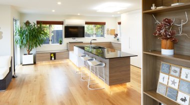 Aurora Australis Interior  – TIDA New Zealand countertop, floor, flooring, hardwood, interior design, kitchen, laminate flooring, living room, real estate, room, wood, wood flooring, white