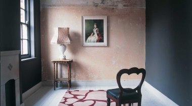 The heart motif is a favourite of Westwood's. architecture, ceiling, chair, floor, flooring, furniture, home, interior design, living room, room, table, wall, window, gray, black