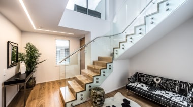 Find out more apartment, architecture, ceiling, daylighting, handrail, house, interior design, living room, loft, property, real estate, stairs, gray