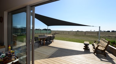 Shade sail Home built by Fowler Homes Taranaki deck, house, outdoor structure, property, real estate, black, teal