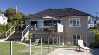 Exterior shot showing stairs down to lawn and apartment, cottage, estate, facade, home, house, property, real estate, residential area, sky, suburb, swimming pool, villa, blue