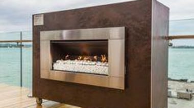 Escea fireplace, clad in Laminam Oxide Moro. - fireplace, gray, orange