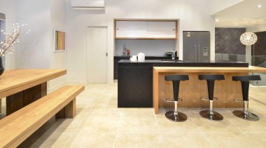 Kitchen with tiled floor and a stretched-wooden dining countertop, floor, flooring, furniture, hardwood, interior design, kitchen, laminate flooring, property, room, table, tile, wood flooring, white
