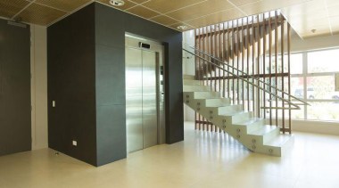 Wall featuring Naturali basalto vena scura and Floor architecture, ceiling, daylighting, floor, flooring, glass, interior design, lobby, real estate, stairs, white