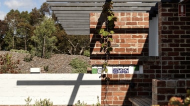 A view of the courtyard area outside one architecture, house, outdoor structure, residential area, roof, gray, black