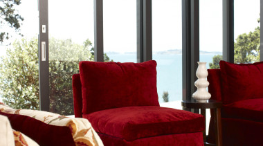 Cosy red sofas with Eurostacker sliding doors and furniture, home, interior design, living room, room, window, window covering, white