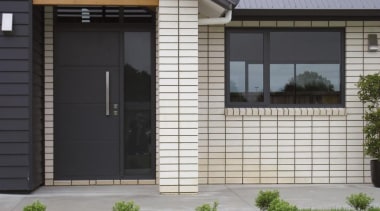 1. Bricks are a natural product and as door, facade, garage door, gate, home, house, porch, property, real estate, residential area, siding, window, gray, black