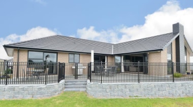 'Pitt" design built by Fowler Homes Northland in architecture, cottage, elevation, estate, facade, home, house, property, real estate, residential area, roof, teal, gray