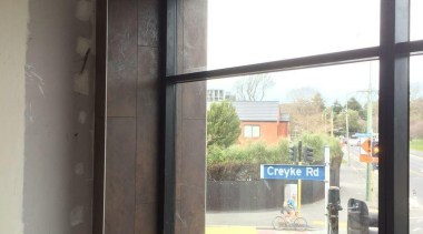 Window frame decoration featuring Oxide Moro. - Creyke door, glass, window, gray, white, black