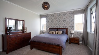 Feature wall accentuated by patterned wall paperHome by bed frame, bedroom, ceiling, estate, home, house, interior design, property, real estate, room, window, wood, gray