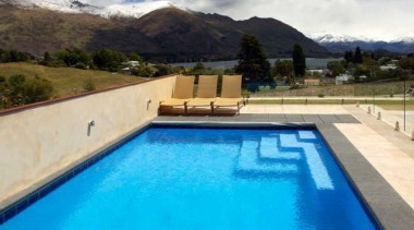 This pool by Mayfair Pools laps against the cloud, estate, leisure, property, real estate, sky, swimming pool, water, teal