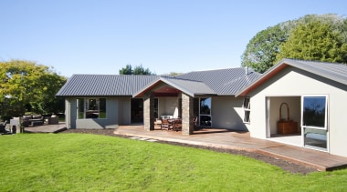 This home is built by Fowler Homes Taranaki.Fowler backyard, cottage, estate, facade, farmhouse, home, house, property, real estate, siding, villa, yard, teal, green