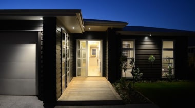 A timber board walk leads to the entry architecture, building, estate, facade, home, house, lighting, property, real estate, window, black