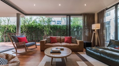 The glass sliding doors are a welcome sight estate, house, interior design, living room, property, real estate, window, gray