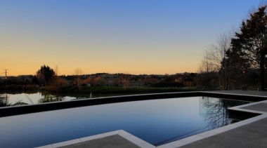 Concrete swimming pool dusk shot - private residence architecture, estate, home, house, lighting, property, real estate, reflecting pool, reflection, residential area, roof, sky, swimming pool, water, black